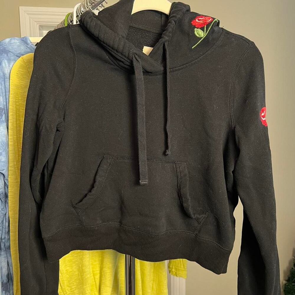 Hollister black hoodie with embroidered roses. Very cute! XS